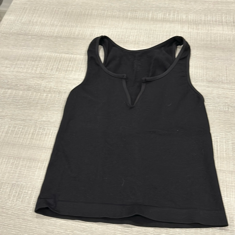 Rock n Rags black tank. One size fits all. Fitted and tight.